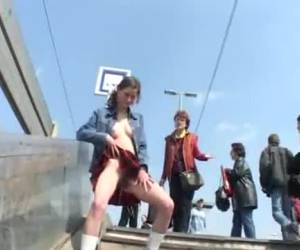this kinky amateur bitch is half nude on a train up the stairs to pee. sucking dicks, bondage in public also means reprimanded by an older lady and need to drain off.